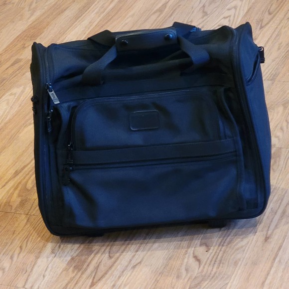 Tumi Black Rolling Travel Bag - Picture 2 of 14